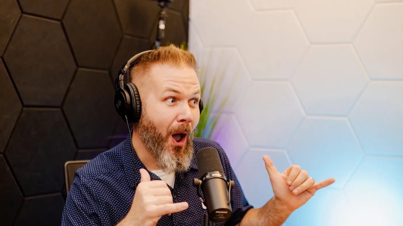 Matt Nelson recording an episode of While Supplies Last, the marketing podcast, in the Podcast Studio San Antonio booth.