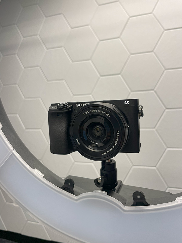 Sony a6400 4K camera with mirorrless lens for podcast video production in San Antonio